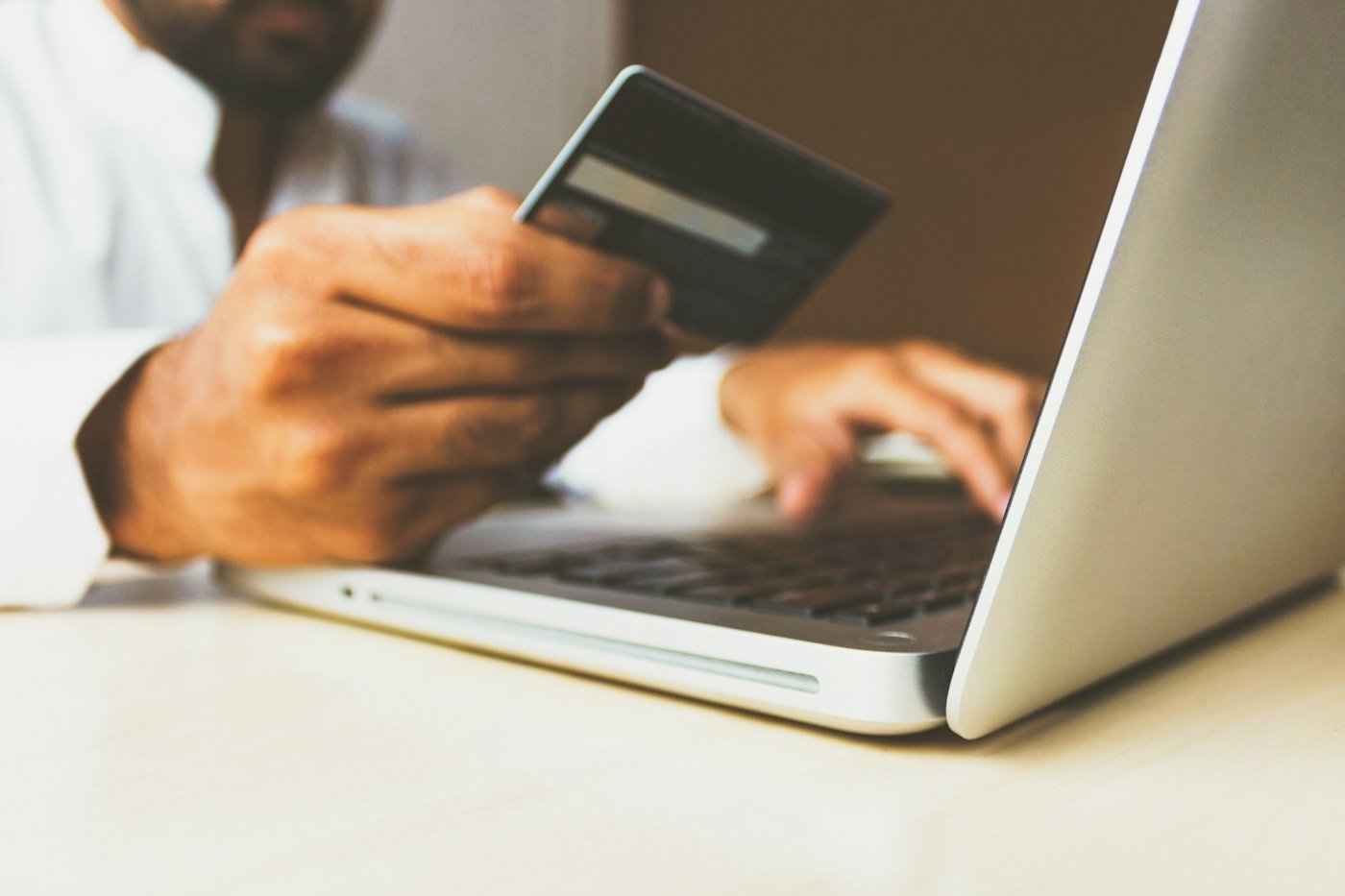 Person shopping online on a laptop
